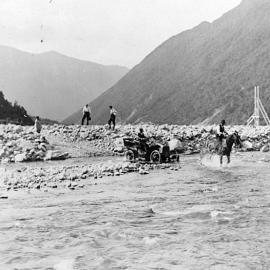 Showing first vehicle to cross Otira Gorge, 1906.