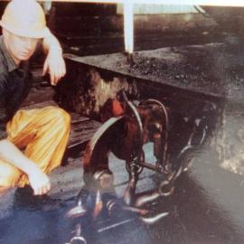 Jim Hill, hooking up last wagon on Denniston incline. 18th August,1967.