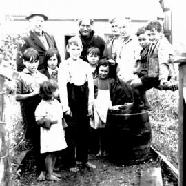 Joe Fluerty middle back with Rochford Family Jacobs River 1930s.