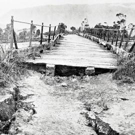 Earthquake damage to the approach to Quinlans Bridge, Karamea, July 1929.
