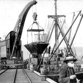 Loading coal on Westport Wharf. 1908.