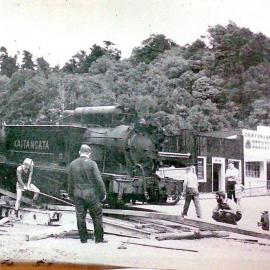The Kaitangata engine being carried to Shantytown by the Ministry of Works, 1971.
