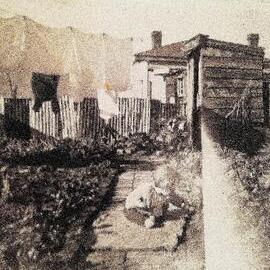 Janet  Newby in the backyard in Blaketown.1952.