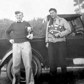 Ron Havill and Harry van Looy with Athletic trophies.1953.