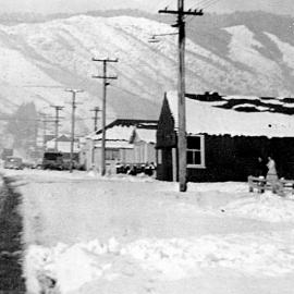 Corner of Shiel and Sinnamon Sts, Reefton, during the 1961 snow.