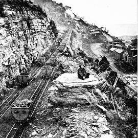 Trucks on the way to and from the bins at the head of the incline,Denniston Mine.ca.1910