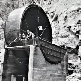 United Bins being erected Ten Mile Valley, Coast Road.