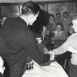 Glen McTaggart receiving cup at Runanga League windup.