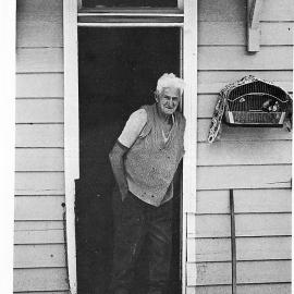 Ted Magee outside his cottage Blacks Point 1981.