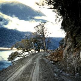 Clarke’s Bluff,Haast Pass Road, on Road trip to West Coast.1960.  -2 PHOTOS-