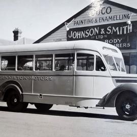 Denniston Motors bus outside Johnson and Smith Ltd garage