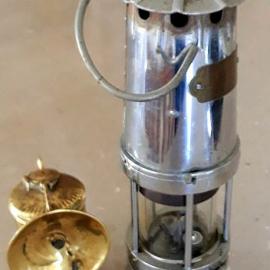 Chromed Naylor lamp and a carbide lamp used in the Strongman Mine.ca.1960-65.