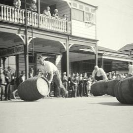 Westport publicans roll barrels down main street in race,for Patriotic Funds.1941.  - 2 PHOTOS-