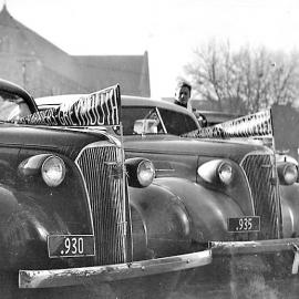 Two 1937 Chevs with Greymouth Harriers flags .1938.