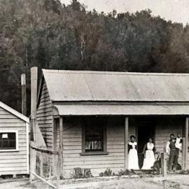 George McInroe & family on the veranda of their home in Blackwater, 1908.