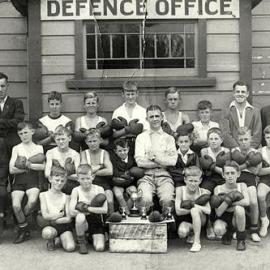 Boxers in front of Defence Office,Tainui St- Cyril Nelson in front row, far right.