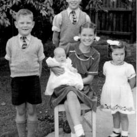 Alison Tuck holding baby Martha Jane (Mel) with Christine, Robert  & Fred (at rear) - 1953