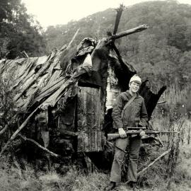 Tuck Family of Nelson Creek:Ross Gillies-Tuck on the West Coast with Ernie's new rifle.1971.