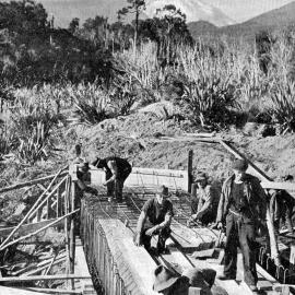 Constructing a culvert near Bruce Bay,1939.
