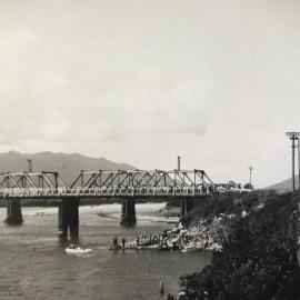 Row boats under Cobden bridges.