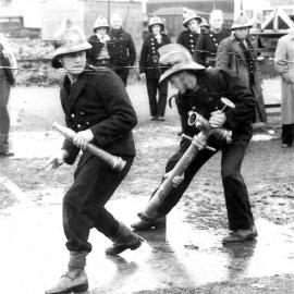 Jim Anthony training with the Runanga Volunteer Fire Brigade.1956.   - 2 PHOTOS -