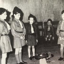 Johnella Bird, Karen Jacobs and Shelley Jacobs being enrolled in the second Greymouth Brownies Pack.1960.