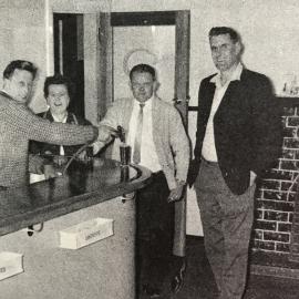 Billy Budd shows off new lounge bar, Australasian Hotel.1960.   *ALAN WISDOM COLLECTION*