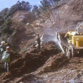 Cutting a new road, Paringa-Haast section.ca.1960`s.   - ALBUM -