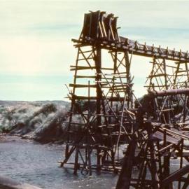 The Blacksand "Blow-Up" Elevator on Charleston beach. 1954.   - 2 PHOTOS -