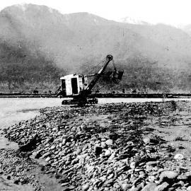 Digger crossing the Karangarua River South Westland .1938.