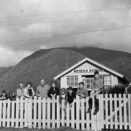Teacher and pupils standing outside Weheka School, Fox Glacier.1953.  - ALBUM -