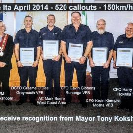 Firefighters honoured for work during 2008 and 2014 storms (Cyclone Ita)