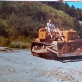 Burying the old dozer at front of 69 Ranfurly (facing 7 Mile Road) Runanga *PHOTO ALBUM*