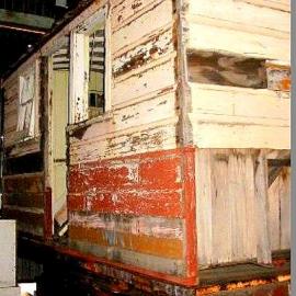 "M" (high-side) wagon, circa 1880 with a circa 1940-1950 Workman's hut.Greymouth.