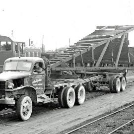 Pile driving rig being removed from Greymouth Wharf.ca.1958.
