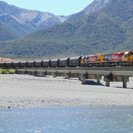 Two DXC locomotives on a coal train from Ngakawau to Lyttelton crossing the Waimakariri River bridge.2015.