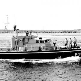 Fisheries patrol vessel H.M.N.Z.S. Kahawai enters the Grey River.1960`s.