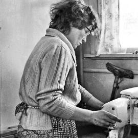 Noeline McCaughan hard at work in the wash house.1967.