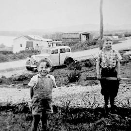 Michael Dense and brother Richard (Dick) on Coleman lawn Moana. 1964.