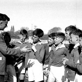 Mr J Knapp with the Buller Primary School Rugby team. 1959.