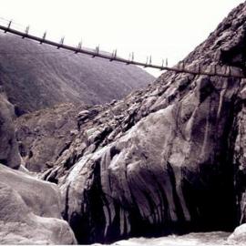 Park Board built the bridge across the glacier  - Franz Josef valley. 1974 .