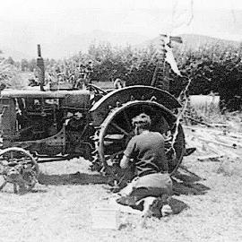 George Shannon fixing his w12 Mc Cormick tractor