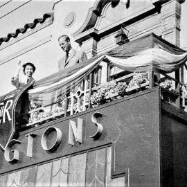 Queen on the balcony of Revington's Hotel, Greymouth