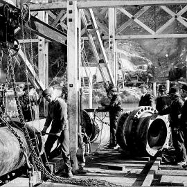 Joining pipes before lowering from Pontoon - Taramakau Inverted Syphon.1912.