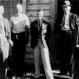 Harry Bateman ( 2nd left)  - lived in a hut at Waimangaroa. ca.1940`s.