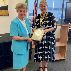 Nancy Holman receives a Civic Award for her service to the community. 