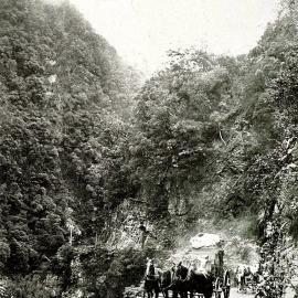A coach going through the Otira Gorge.1913.