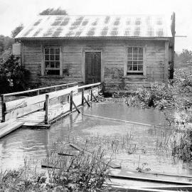 A house by the Deep Creek Bridge near Kotuku-  during a flood.