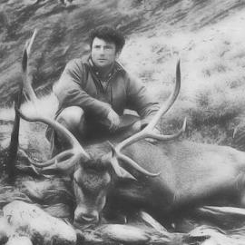 Frank Erceg  with 11 pointer stag in the Te Naihai Valley, South Westland, 1962.