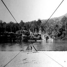 ALBUM - Rope way across Buller river from Mackley Sawmill at Rahui, Buller Gorge.1930`s.